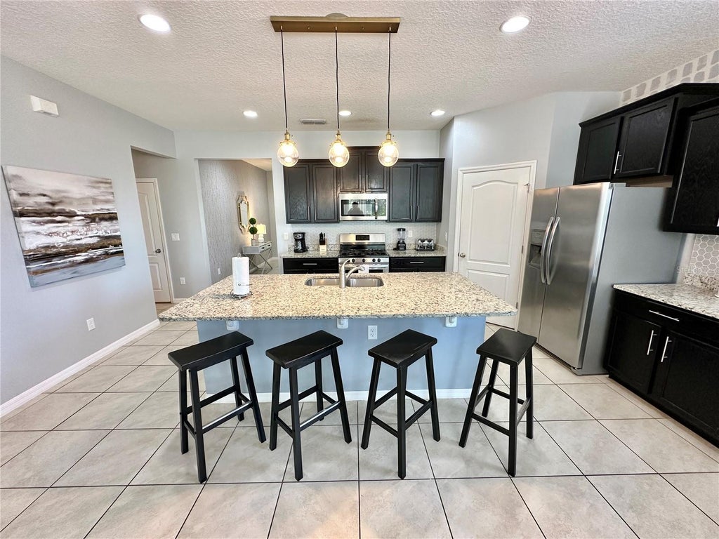 Photo of 8043 Oak Shadow Court, Davenport, FL 33837 (MLS # O6449849)