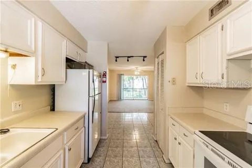 Photo of 7537 Pitch Pine Circle N #C, Tampa, FL 33617 (MLS # TB8427481)