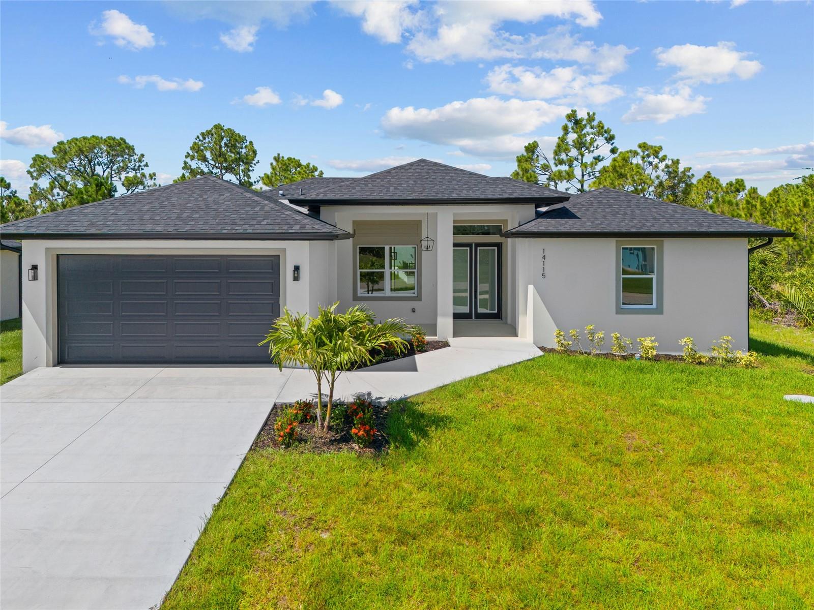 JUST COMPLETED! BRAND NEW, CUSTOM-BUILT 4 BED, 2 BATH, 2-CAR GARAGE HOME IN SOUTH GULF COVE! Experience modern luxury and durability in this stunning new construction home, designed with premium materials and thoughtful details for comfort and style. Offering high-end finishes with practical features to suit discerning homeowners. Open floor plan with 10 ft ceilings, contemporary lighting, tray ceilings with crown molding, oversized 8’2- panel doors, recessed LED lighting, luxury vinyl throughout plus much more. Well-appointed kitchen offers quartz waterfall countertops, high-quality plywood shaker cabinets with soft close drawers, and Center Island with breakfast bar plus dining area. Generous primary bedroom with en-suite bath featuring dual sinks and walk-in tiled shower. Split floor plan provides guests with plenty of privacy with 2 additional bedrooms and a full guest bath. Outdoor entertaining area features covered lanai and room for a pool. Special features include impact windows for enhanced safety, GAF Architectural shingles with superior durability, 9’1 elevation for optimal flood protection, wifi garage door opener, rain bird irrigation system and deep garage for extra storage! South Gulf Cove community offers voluntary HOA with clubhouse for special events, four parks nearby including South Gulf Cove Park and Boat Ramp and close to fine dining, shopping, parks, numerous golf courses, boating, and a short drive to Boca Grande and Don Pedro Island beaches. Don’t miss this opportunity! Schedule your private showing today!