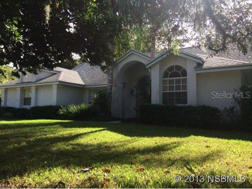 ESTATE SALE! Fabulous Sugar Mill Country Club home available now for a new family! Great open floor plan, fireplace, tile throughout living area. Screened solar heated pool. Large driveway, very private back yard with a brook running along the property line, producing lemon trees. This home is a must see. ;Water: City