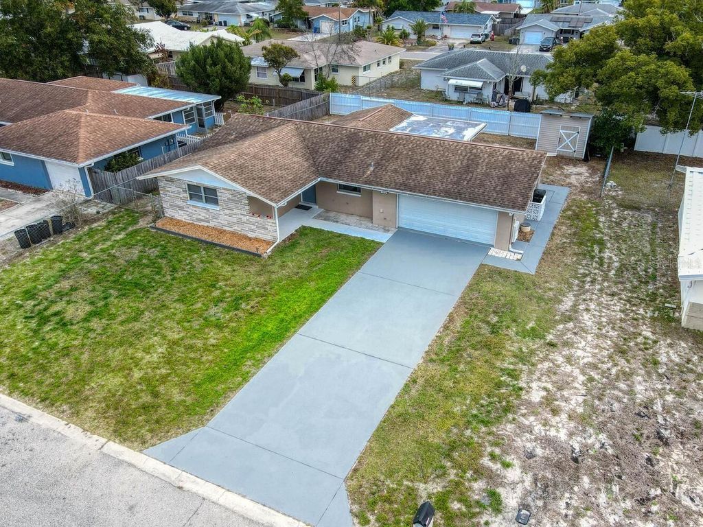 Photo of 10320 Honeysuckle Lane, Port Richey, FL 34668 (MLS # W7882585)