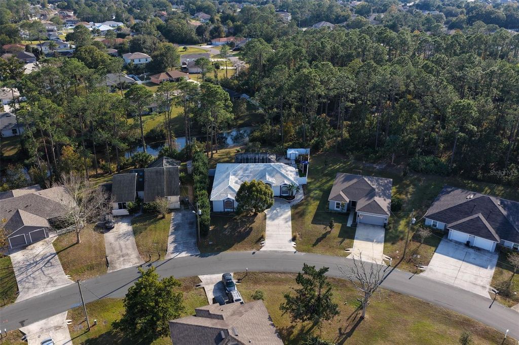 Photo of 74 Plain View Drive, Palm Coast, FL 32164 (MLS # FC314548)