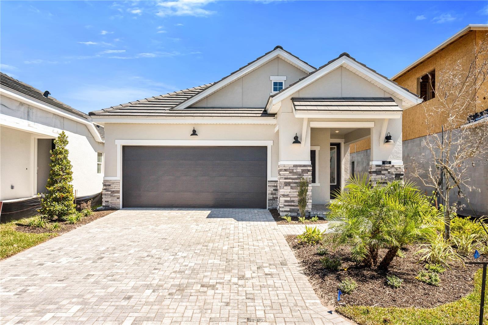 David Weekley Homes at Vistera of Venice is a resort-inspired and maintenance included community that offers a variety of
amenities to its residents. The Club is the heart of this new community, where you can relax, mingle, and enjoy life more. Take a refreshing dip
at the resort-inspired pool, and later, bask in the Florida sunshine on the deck. Stay connected wherever you are with the community’s Wi-Fi.Vistera’s bike share program makes it easy to explore the world on two wheels. You can pick up your bicycle at the designated station and enjoy
the multi-use trails or venture out further. Transport yourself with natural beauty and clear your mind at Vistera’s serene recreational trail. The modern fitness center is fully equipped with
cardio and strength training equipment.
Welcome to The Queensgate, a beautifully designed 1,837-square-foot gem that combines modern luxury with functional elegance. This spacious floorplan features 3 bedrooms, 2 bathrooms, and a 2-car garage, offering ample space for comfortable living.
The open-concept design seamlessly connects the living, dining, and kitchen areas, making it ideal for both everyday living and entertaining. You'll appreciate the study, perfect for a home office or a quiet retreat.
Step inside to discover a host of premium upgrades, including stunning wood laminate floors that enhance the home’s aesthetic appeal. The designer cabinets and quartz countertops throughout the home add a touch of sophistication and durability. Oversized windows flood the space with natural light, creating a warm and inviting atmosphere, while impact glass windows provide added security and energy efficiency.
Experience the perfect blend of style and practicality in The Queensgate—where every detail is crafted for modern living.