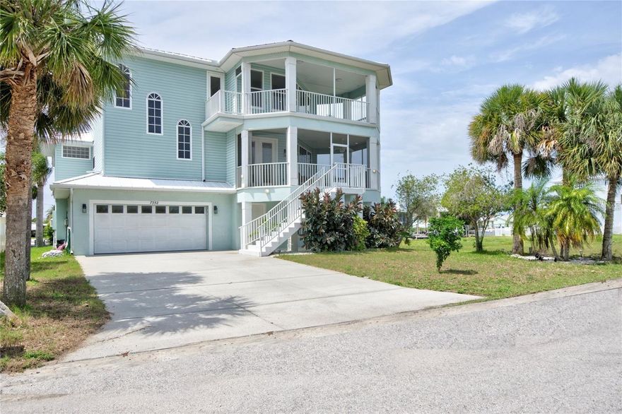 This one-of-a-kind custom waterfront home in Hudson Beach delivers exceptional coastal living and peace of mind. Unaffected by Hurricane Helene, the property sits on one of the highest elevations in Hudson and offers breathtaking Gulf of Mexico sunset views from an oversized third-floor balcony.

Boaters will appreciate the direct Gulf-access canal with deep water and no fixed bridges, along with a new dock, 12,000 lb boat lift, and beautifully finished pavered outdoor spaces—perfect for entertaining.

Located on Rainbow Palms, one of Hudson’s most desirable and recently developed streets, the neighborhood features underground utilities, a wide dead-end road, and a private community boat ramp available for a nominal $100 annual fee.

Inside, the home showcases soaring 20-foot ceilings in the main living area, elevator access to all levels, and expansive windows that frame stunning water views from nearly every room. Designed for both comfort and luxury, this residence offers a rare opportunity to enjoy the best of Florida waterfront living.

Conveniently situated in a golf cart-friendly community near local dining, shopping, beaches, and parks, this property combines lifestyle, location, and lasting value. Also the adjoining lot is available