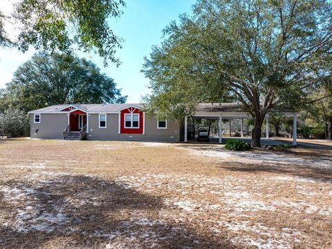 Photo of 6780 NW 41st Cir Circle, Bell, FL 32619 (MLS # GC528069)