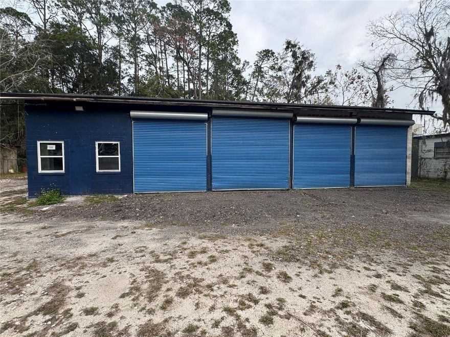 1550 SE Third Ave, Gainesville, FL 32641 — Industrial/automotive facility for lease offering 3,612± SF on a 0.33± acre lot, ideal for auto repair, body shop, paint shop, or light industrial use. The property includes office space, 3-phase power, two car lifts, two bathrooms, dedicated paint and body shop areas, and six bay doors (three 10’, one 12’, and one 8’) providing efficient vehicle access and workflow. Functional layout in a convenient SE Gainesville location with easy access to major roadways. Suitable for users seeking a well-equipped, turnkey automotive or industrial space.