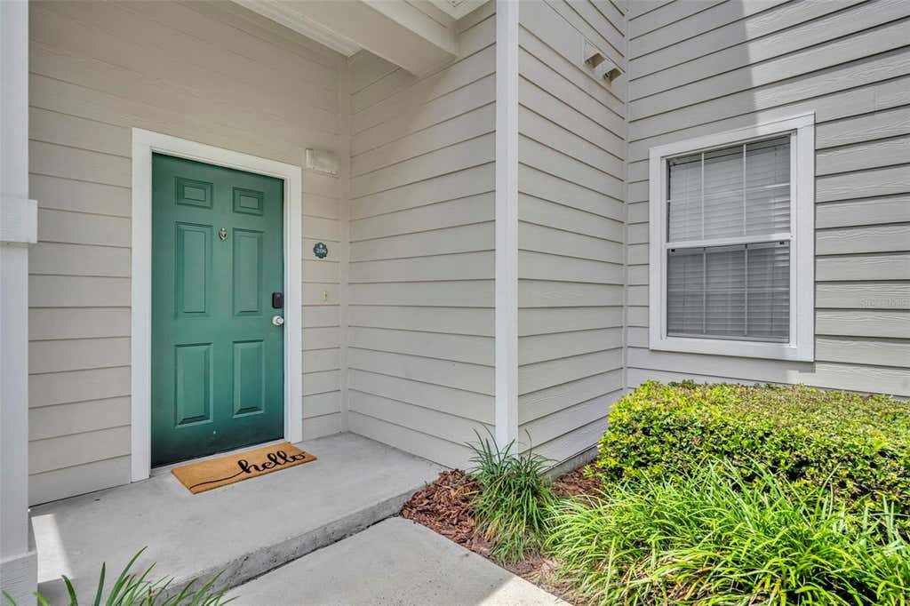 Photo of 200 Southern Pecan Circle #206, Winter Garden, FL 34787 (MLS # O6411162)