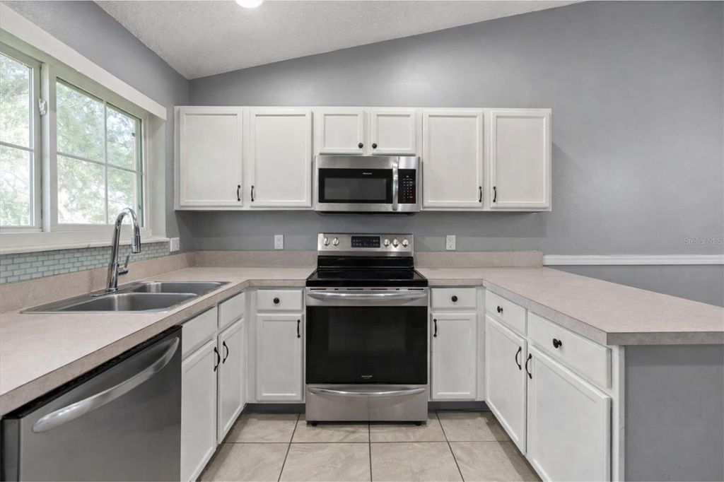 Photo of 2832 Osprey Cove Place #202, Kissimmee, FL 34746 (MLS # O6387695)