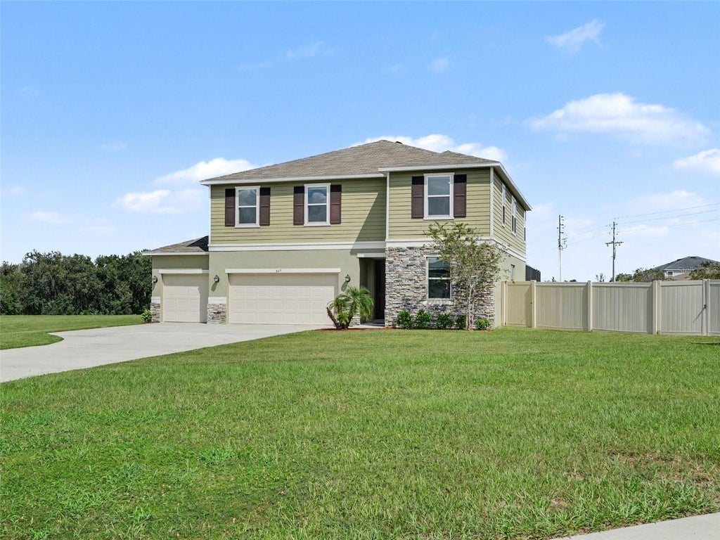 Photo of 669 Sarner Pass Way, Winter Haven, FL 33881 (MLS # TB8556664)