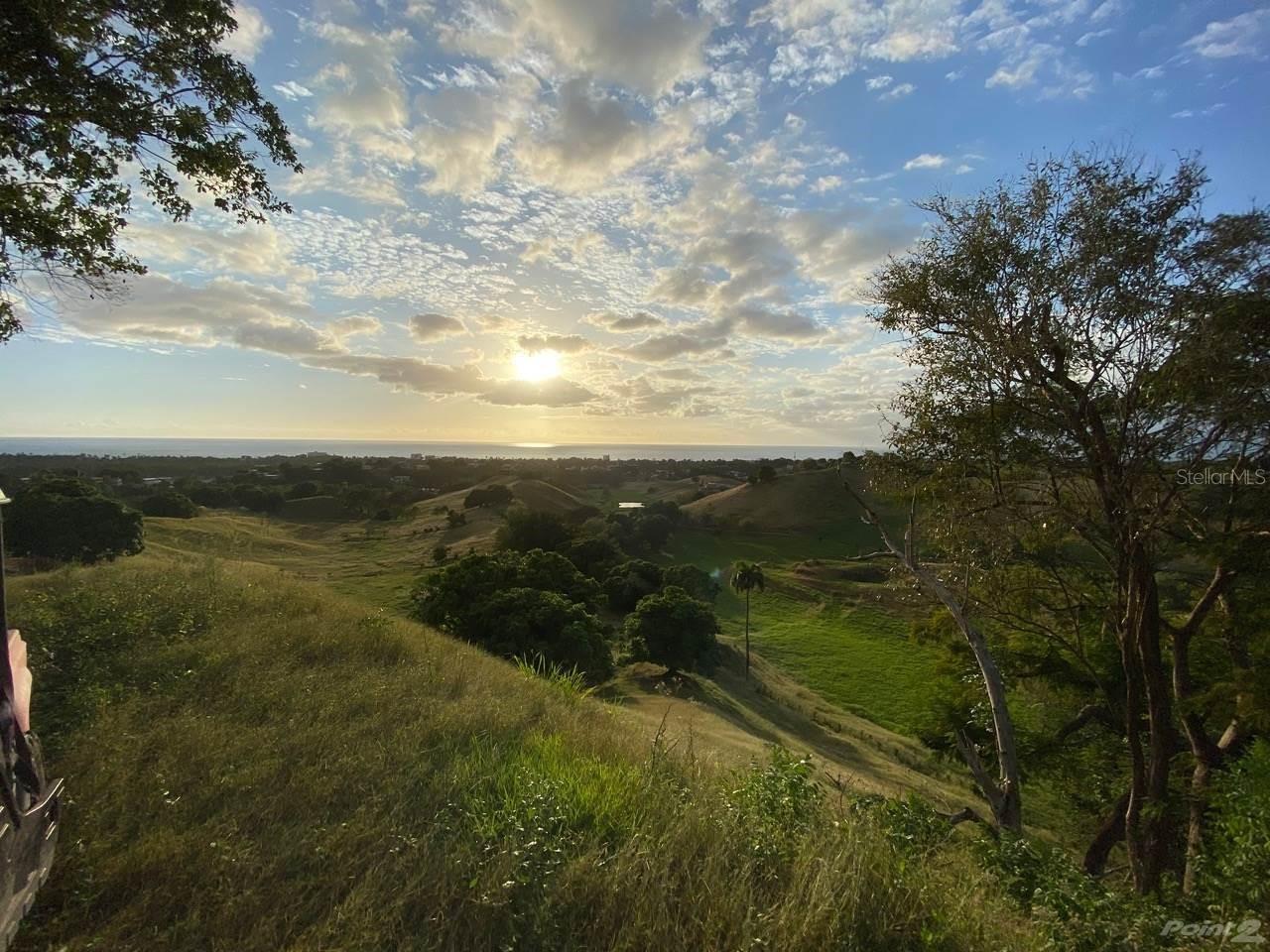 100 acres of hidden land in the heart of Rincon, PR. Breathtaking ocean and mountain views, and only minutes to town center and beaches. You will have lots of privacy, but can also enjoy the town, beaches, and the relaxation life. Ideal for ecolodge, family community or keep part and sell other lots. Existing buildings need remodeling.