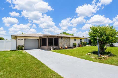 Photo of 22128 Bronxville Avenue, Port Charlotte, FL 33952 (MLS # C7528085)