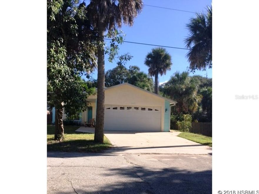 This Affordable, Turn Key Beach Bungalow is positioned perfectly only 2 Blocks from direct ocean access, where you can open your beach chair and slide your toes in to the warm, white sand. Or if it's an active and intriguing day desired for activities such as art festivals, wine tastings amid the eclectic shops lining Famous Flagler Ave, again, you're only 2 Blocks away from Delicious Restaurants and a thriving nightlife. Home has a new side by side Refrigerator and Microwave, as well as a new Natural Gas A/C System installed 8/2018. Seller also wanted to let you know, this is (and has been) a non-smoking home for those of you seeking such. Now, although this roomy Concrete Block, 2 Bdrm, 2 Bath, 2 CG home has great bones, numerous walk-in closets for storage/clothes, an open concept and soaring ceilings, some TLC is in order. Home will need a new roof (so cash offers are suggested) and some additional refreshing here and there. The private back yard awaits a landscaper's touch to create a beach side oasis among the mature and shaded trees framing the rear of the property, all to be enjoyed from the existing porch. This well located Home is priced accordingly and awaits your visit. Furniture, decor and furnishings are being left for your convenience as the Buyer and do not add to the value/pricing of the home. All information included is thought to be accurate, but please confirm information important to you. ;Water: City