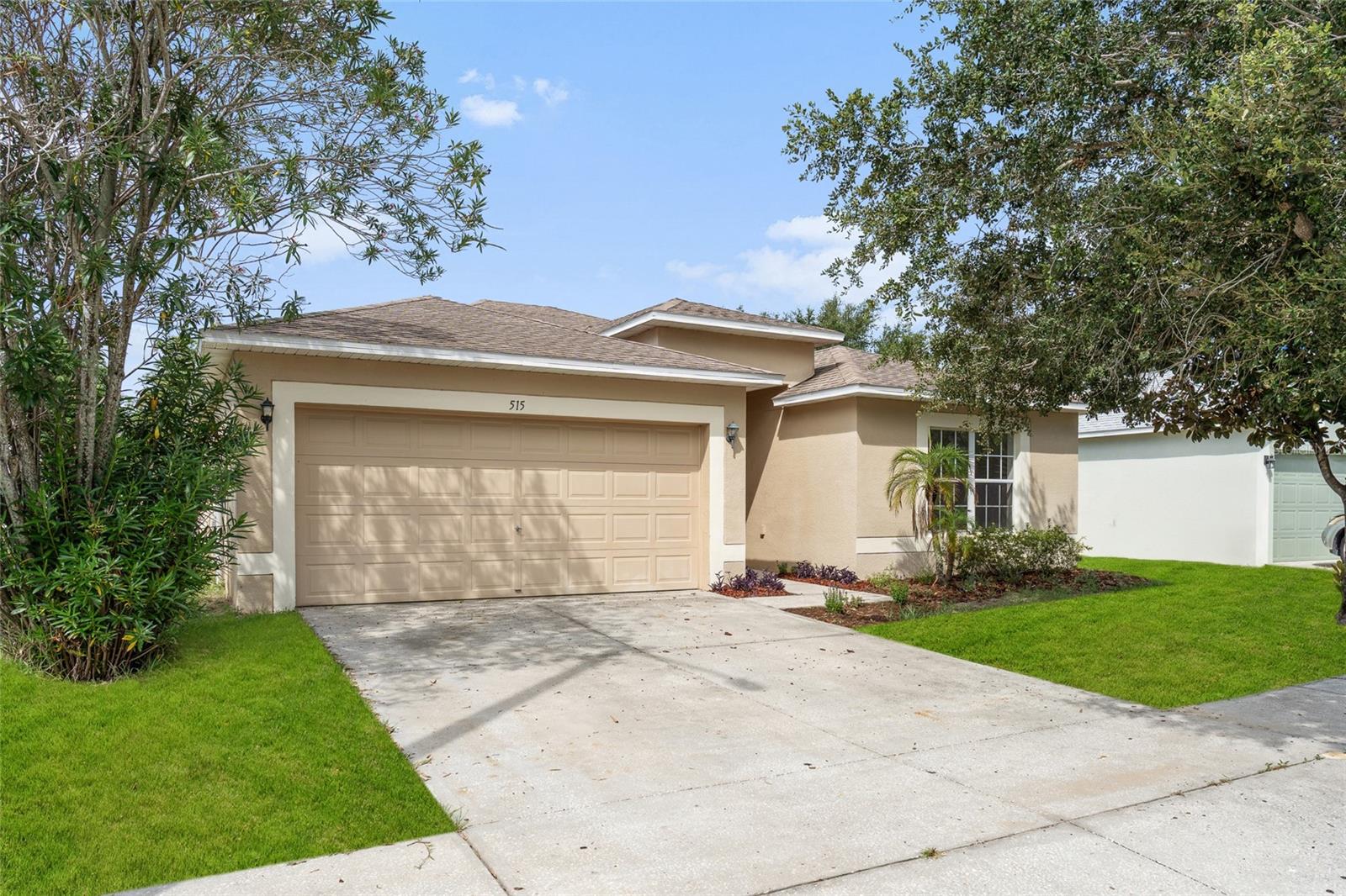 Discover your perfect slice of Florida sunshine in this well-maintained 3-bedroom, 2-bathroom home, nestled within an established community. Step inside and be greeted by a bright and inviting interior, featuring a thoughtful layout that maximizes space and natural light. Arched entryways and unique design details elevate the home's aesthetic. With both a formal living room and a relaxed family room, this open floor plan provides the perfect setting for your family and seamlessly connects to the dining area. The well-appointed kitchen boasts ample cabinet space and countertops, a convenient breakfast bar, and an eat-in breakfast nook. The primary suite includes a large walk-in closet and a private en-suite bathroom with a double sink vanity. Conveniently located, this home is just minutes from I-4. Lake Eva Community Park, a true gem, is only an 8-minute drive away, offering an aquatic center, playgrounds, sports courts, and scenic walking trails. This home is situated in a prime location that balances peaceful suburban living with the excitement and convenience of Central Florida's dynamic offerings.