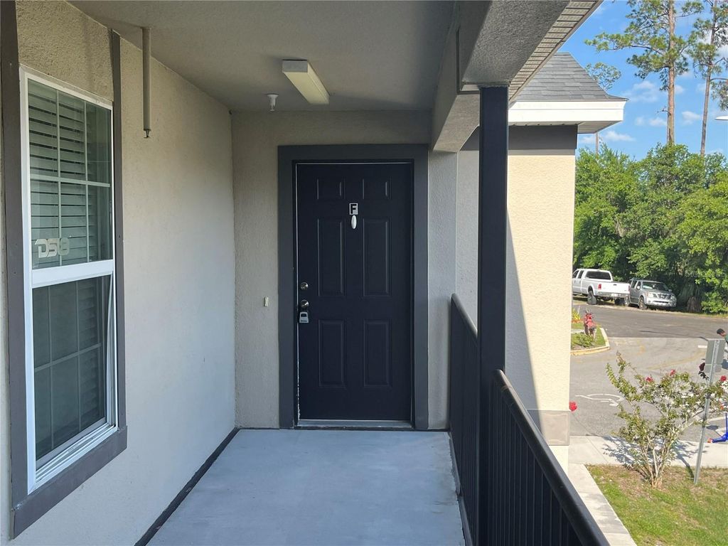 Photo of 295 Flower Lane #F, Kissimmee, FL 34743 (MLS # O6411360)
