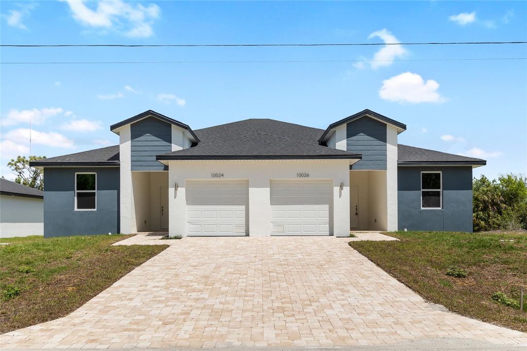 Photo of 10026 Cocoa Beach Street, Port Charlotte, FL 33981 (MLS # S5148380)