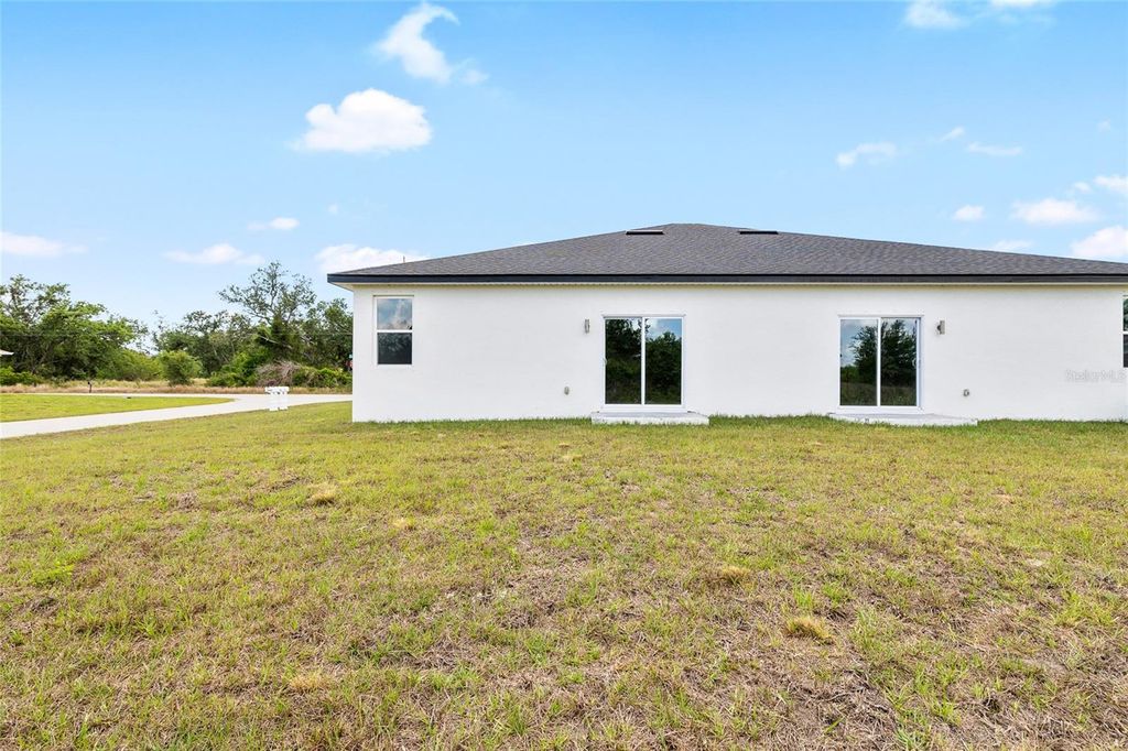 Photo of 10026 Cocoa Beach Street, Port Charlotte, FL 33981 (MLS # S5148380)