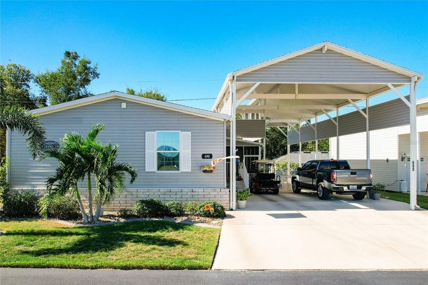 INTRODUCING this VERY unique, yet MODERN, hurricane RESISTANT Townhome Doublewide, that is ready for you to call home!

This exceptional 3-bedroom, 2-bath residence is a rare find in the highly desirable Lily Lake Golf & RV Resort community. Designed with elevated standards and built in 2018, the home showcases a spacious open floor plan, a separate laundry room, and a thoughtfully split-bedroom layout that maximizes privacy and comfort.

As you enter, you’re welcomed into a bright and airy kitchen featuring an oversized walk-in pantry, seamlessly connected to the dining and living areas. The primary suite is privately situated to the right of the entry, complete with an en suite bath, while two additional bedrooms and a guest bath are located to the left—ideal for hosting guests or creating a home office.

The home is offered turnkey, with tasteful furnishings and décor throughout. From the laundry room, step into a screened lanai with patio seating that overlooks a beautifully constructed port—perfect for your RV or boat—with no rear neighbors and a quiet location on a gentle curve of the street.

Built with enhanced structural features including 2x6 framing, reinforced tie-downs, and a hurricane rating up to 130 mph, this home offers peace of mind and long-term durability. The adjacent port is anchored with 4-inch cemented columns, providing secure and versatile parking options.

Interior finishes include waterproof vinyl flooring in a neutral tone that flows seamlessly throughout the home—no transitions between rooms. A custom built-in bookcase in the living room offers a serene place for your television, artwork, and personal library.

Community Highlights at Lily Lake Golf & RV Resort:

• Deeded land ownership—no lot rent
• 9-hole golf course (open to the public, with share purchase options)
• Heated pool, Jacuzzi, and fitness center
• Pickleball, tennis, shuffleboard, and cornhole courts
• Clubhouse, billiards room, library, and laundromat
• Internet, cable TV, yard maintenance, and trash pickup included
• Active social calendar September–April, with year-round events for full-time residents


Lily Lake is a one-of-a-kind community offering a vibrant lifestyle, exceptional amenities, and a welcoming atmosphere. Whether you’re seeking a seasonal retreat or a full-time residence, this property delivers the perfect blend of comfort, security, and convenience.

Come experience the best of Florida living—make Lily Lake your home today.