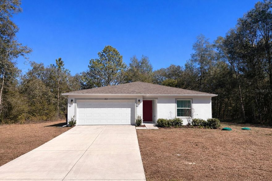 If you're looking for a nearly-new construction with PRIVACY, then you'll love this beautiful home on a corner lot in Citrus Springs! Home looks and smells brand new. Open floor plan with higher-than-normal quality vinyl flooring throughout and new carpet in bedrooms. Easy-step-in owner's shower. Home is equipped with gutters and downspouts. High-height granite countertops and wood cabinets. Nice location near Hwy-41. Beautiful newer construction homes in the area. Great schools. One can get a lot of home for the money in Citrus Springs. It's a nice laid back rural feel, and yet this home is only 8 minutes to the charming town of Dunnellon with its shops, stores and restaurants; 16 minutes to Target, Hobby Lobby, and all the new growth in Lecanto; 8 minutes to the crystal-clear Rainbow Springs for kayaking, tubing, and snorkeling; 35 minutes to anything one could want in Ocala; and 37 minutes to King’s Bay/Crystal River and the Gulf of Mexico. Zero HOA fees! Welcome to your own slice of Florida sunshine. Come see it today!