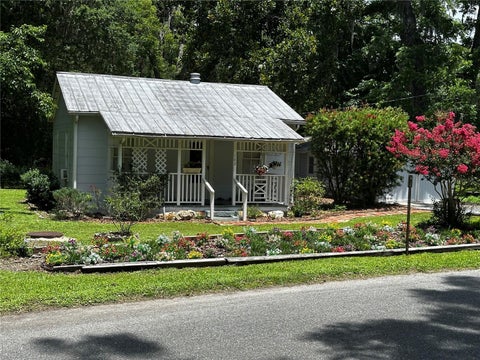 Photo of 142 NW 2nd Avenue, Williston, FL 32696 (MLS # OM725875)