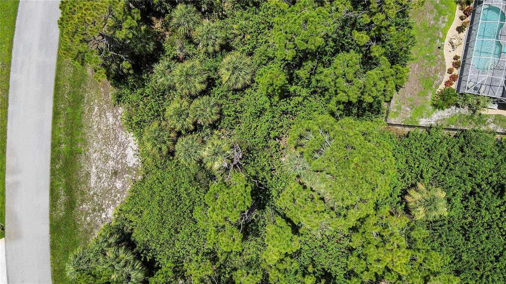 Photo of 124 Coca Lane, Rotonda West, FL 33947 (MLS # A4703028)
