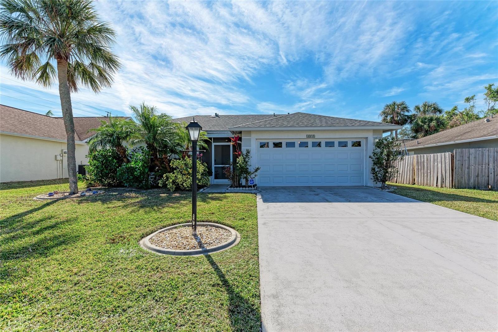 Buyers Financing Fell Through so back on the market! - POOL HOME – Move-In Ready & Perfectly Located! - Discover this charming 3-bedroom, 2-bathroom home offering the perfect blend of comfort and convenience. Enjoy Florida living with a screened-in pool and a private backyard featuring two types of mango trees, a star fruit tree, and a lemon tree—your own tropical oasis! Inside, the open floor plan makes entertaining a breeze. Recent upgrades include a NEW ROOF (2023), NEWER AC system, NEW Impact Garage Door, and a NEW Water Heater. Fresh paint in the common areas adds a modern touch. Centrally located with easy access to UTC Mall, shopping, dining, entertainment, and world-famous beaches like Siesta Key and Anna Maria Island. One of the lowest-priced pool homes in Sarasota—don’t miss this opportunity! Schedule your showing today!
