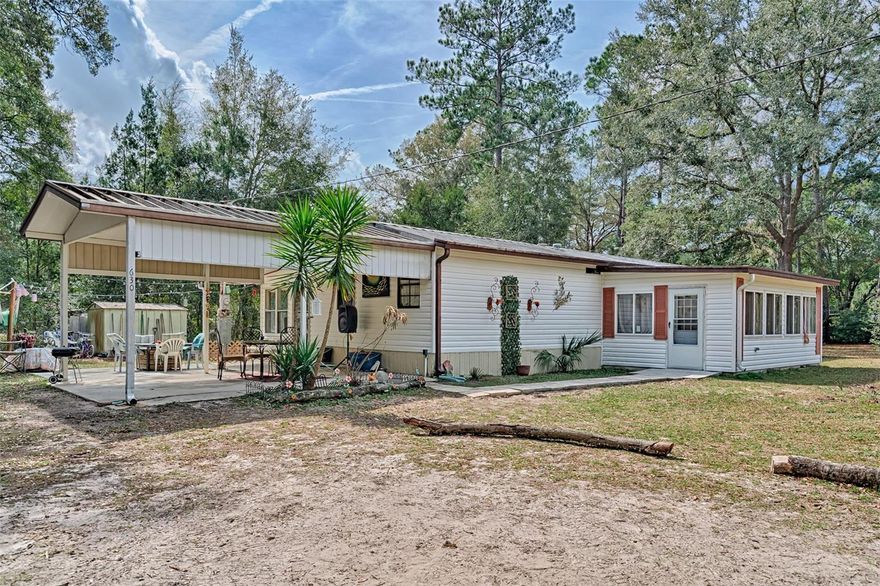 Discover the freedom to create your dream lifestyle on almost 2 fully fenced acres in Old Town, where this inviting manufactured home sits on a beautiful blank canvas ready for your personal vision; a large cleared portion of the property offers incredible flexibility for gardens, a workshop, outdoor entertaining areas, recreational toys, or future improvements while still leaving room to enjoy wide open skies and the privacy that makes country living so special; imagine evenings under the stars, space for animals, room to spread out, and the peace and quiet that’s getting harder to find, all just minutes from the natural beauty and recreation of the Suwannee River and within easy reach of shopping, dining, and everyday conveniences in Cross City and Chiefland, plus access to well-rated local schools; whether you’re looking for a private homestead, weekend retreat, or a place to truly make your own, this property offers the space, freedom, and peaceful Florida lifestyle you’ve been dreaming of—schedule your private showing today and come experience the possibilities for yourself!