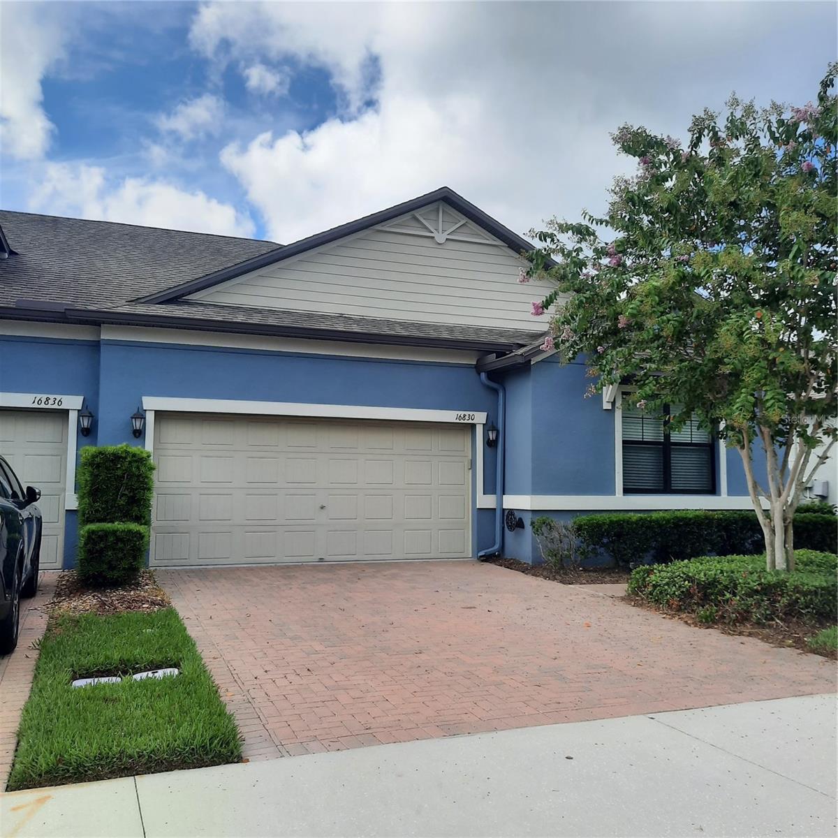 SELLER WILL CONTRIBUTE $5,000 TOWARDS BUYER’S CLOSING COSTS. Don’t miss this opportunity to live in this newer gorgeous one-story Bexley villa with a serene wooded view. No back yard neighbors here. Scale down maintenance without sacrificing space. Enjoy a two-car garage plus a screened lanai. The 2200 sf floor plan is wide open and features 5 walk-in closets including the pantry! There are 2 master suites, split, for maximum privacy, plus an office with a closet. Two baths have double vanities, plus there is a powder room for guests. The island kitchen has amazing counter space—all granite, cabinets galore, and stainless appliances. Newer washer and dryer are included in the oversized laundry room. More storage and counter space are in the butler’s pantry. Home is upgraded with luxury laminate and tile flooring throughout, “smart home” technology, a tankless water heater, double paned windows, and hurricane shutters! Bexley is conveniently located just off the Suncoast/Veteran’s Expressway & SR 54 with everything nearby. Enjoy the Bexley community pools, playgrounds, dog parks, walking & bike trails, clubhouse with café and fitness center. Schedule your tour before this well priced beauty with low fees is gone.