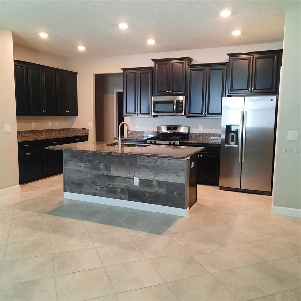 Photo of 16830 Balance Cove, Land O Lakes, FL 34638 (MLS # TB8412315)
