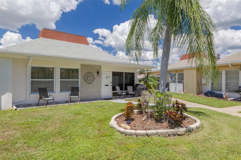 Photo of 4355 Tahitian Gardens Circle #A, Holiday, FL 34691 (MLS # TB8411324)