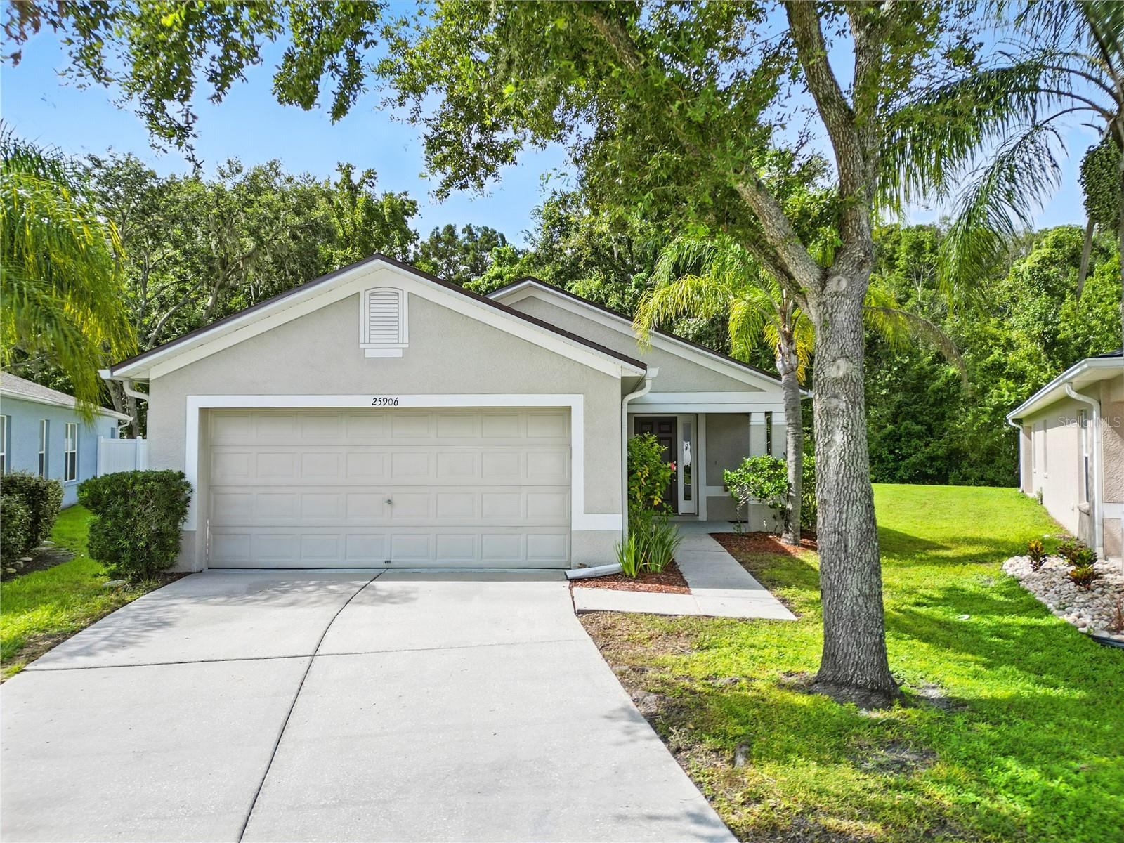 Bring Your Offers! Seller Offering $2,500 Toward Closing Costs – Charming 3-Bedroom 2-Bath Home in Grand Oaks, Land O'Lakes!!!
Welcome to this 3-bedroom, 2-bath home in the Grand Oaks community. Nestled on a peaceful conservation lot with mature landscaping, this home offers a quiet, private oasis with no rear neighbors—ideal for those seeking both comfort and tranquility.
Step inside to find beautiful laminate flooring throughout and a bright, open living and dining space perfect for everyday living or entertaining. The spacious kitchen is the heart of the home and features sliding glass doors that open directly to a covered lanai, seamlessly extending your living space outdoors. The lanai is equipped with hurricane-strength screening to provide additional home protection during storms, allowing you to have peace of mind.
Each room includes a ceiling fan, enhancing airflow and comfort throughout the home. The split-bedroom floor plan offers privacy, with the primary suite separated from the secondary bedrooms—ideal for guests or a home office setup.
Key updates include a roof that’s only 2–3 years old, a 2-year-old A/C unit, and a 2-car garage for added convenience and storage.
As an added bonus, the seller is offering $2,500 toward closing costs, making this move-in-ready home even more appealing for buyers.
Whether you're a first-time buyer, downsizing, or investing, this Grand Oaks gem has everything you're looking for. This community offers resort-style amenities—pool, spa, playground, basketball courts, and more— Enjoy Florida beauty as you walk through over a mile of trails in the neighborhoods conservation area and great restaurants just minutes away from your home as well as enjoying the convenient shopping, good schools, and easy commuter routes.
Lovely neighborhood, charming home, great location - Schedule your showing today!