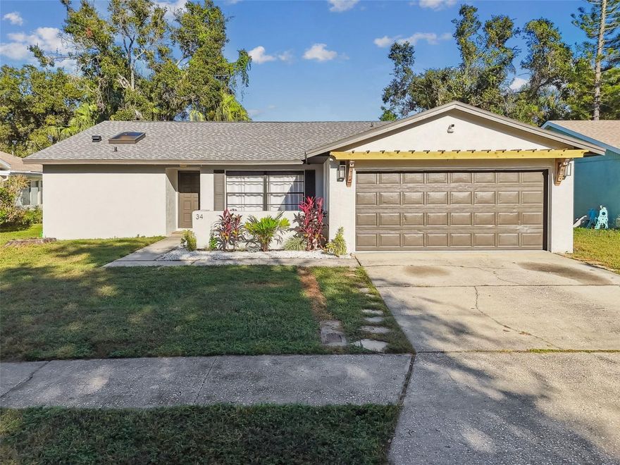 Move-In Ready! Welcome to your dream home in the peaceful, tree-lined, golf cart-friendly community of Harbor Oaks, located in the charming city of Safety Harbor! This beautiful, carefully updated home offers many reasons why you must see it! Upon entering, you'll find a huge family room with a beautiful feature wall and a wood burning fireplace. The spacious formal dining room is to the right and is adorned with large windows. Just beyond this is the NEW CUSTOM DESIGNED KITCHEN with wood cabinets and gorgeous quartz counter tops, lots of storage, upgraded appliances, and even a coffee station! From the kitchen, you overlook the eating space with views of the private, fenced yard. There is no shortage of light in this home – large windows, sliding doors, new recessed lighting throughout! Enter the Primary Suite to find a bonus room that can be used as an office, a nursery or even a workout space. Barn doors separate the bonus room and the spacious light and bright primary bedroom. You’ll immediately notice the UPDATED PRIMARY ENSUITE, with dual sinks, wood cabinets and a large luxurious shower.  The ensuite also has a private water closet, linen closet and a walk-in closet. This split plan has AN additional two bedrooms and guest bath, all updated with new floors, paint, features walls and NEW APPOINTED GUEST BATH.  So many things are new! NEW ROOF in 2023, NEW A/C in 2023, newer flooring throughout, updated bathrooms, new light fixtures and ceiling fans. All this and NO FLOOD ZONE!! The backyard has a large patio, no rear neighbors and plenty of room to make it your perfect oasis! The sellers have renderings of beautiful pool/patio at the home-a must see. You also have great schools nearby: Safety Harbor Elementary & Middle School. Safety Harbor is a wonderful location – easy access to downtown St. Pete and downtown Tampa, 20 minutes to Tampa Int’l Airport, 12 minutes to St. Pete/Clearwater Airport, 15 minutes to Downtown Clearwater, 20 minutes to the world famous Clearwater Beach! Close to shopping, golf courses, racquet courts, and more! And the best part? You’ll be living in a quaint, lively, golf cart friendly town with an amazing sense of community! Safety Harbor has small shops, delicious restaurants, parks, biking, boating, weekend markets, art shows, food festivals and so much more! Here is your opportunity to live the lifestyle most Floridians dream of! It’s literally the kind of town that you’ll see in a movie (it really was!). The beautiful Phillipe Park (waterfront on Old Tampa Bay with boat ramp, playgrounds, walking trails, and more), Veteran’s Memorial Marine Park, and smaller parks are appointed throughout the town. It’s truly an amazing opportunity to live your dream life! Call for an appointment today!