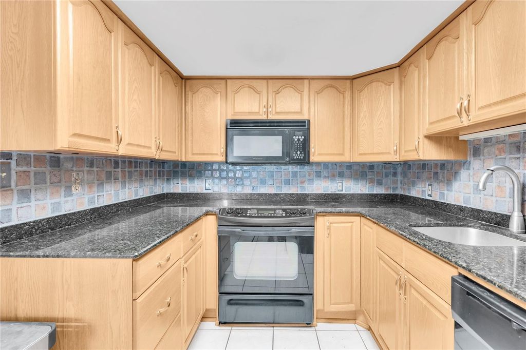 Photo of 1 Key Capri #303E, Treasure Island, FL 33706 (MLS # TB8380378)