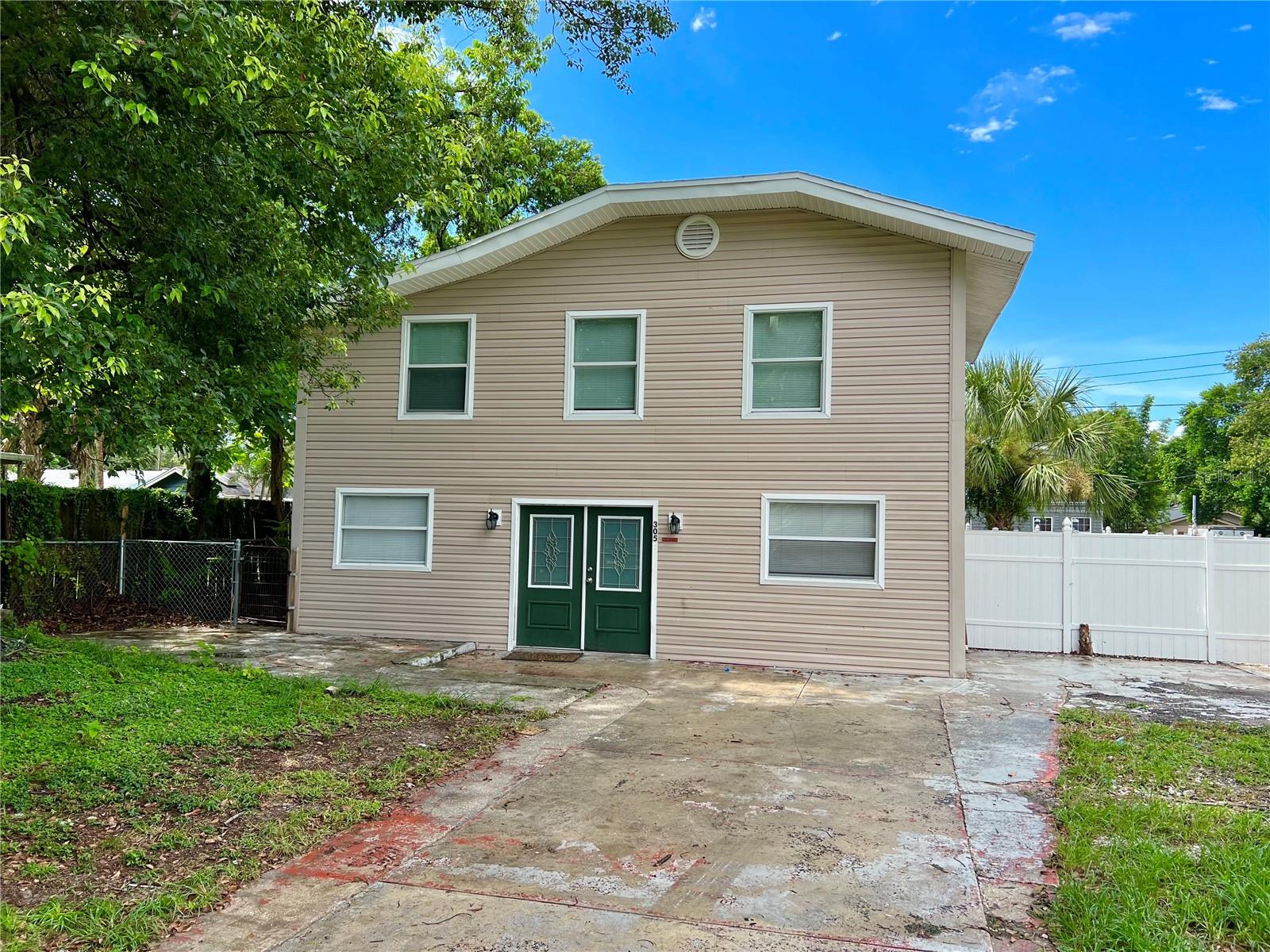 Now available to rent!!! This two story home located in Old Seminole Heights sits on a double lot and has 4 Bedrooms, 3 Full Bathrooms plus an office (which could be used as an additional room) and offers TONS of space. This home has been updated with new luxury vinyl plank flooring and plush carpets in the bedrooms. The first floor features a large living room, laundry room with WASHER/DRYER INCLUDED, 1 Bedroom, 1 full bathroom, an office and a spacious eat-in kitchen with plenty of cabinet space and granite countertops. Upstairs you will find a bonus room and three good sized bedrooms, including the master suite with jacuzzi tub, his/hers sinks, and separate shower stall. This home sits near the rear of the property and therefore has plenty of parking and the backyard is fully fenced! Great Location walking distance to the Seminole heights trendy restraints and bars. Only 5 miles to University of Tampa and 6 miles to University of South Florida. Pet Friendly! Call today to schedule a viewing.