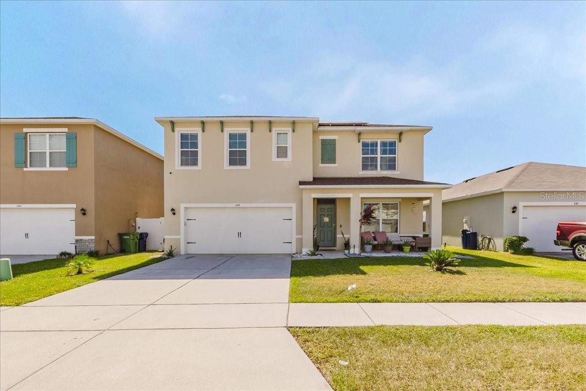 Welcome to this stunning 5-bedroom, 3-bath home located in the Jace Landing community of Winter Haven. Built in 2021, this modern two-story residence provides nearly 2,700 square feet of living space designed for comfort, flexibility, and contemporary living. The open-concept layout features a bright and spacious great room, modern finishes, and a large kitchen with stainless steel appliances, ample cabinetry, and an oversized island perfect for family gatherings and entertaining. The first floor also includes a versatile flex room or optional sixth bedroom and a full bathroom, making it ideal for guests, a home office, or multi-generational living. Upstairs, the primary suite provides a private retreat with a large walk-in closet and an ensuite bath featuring dual vanities and a walk-in shower. Four additional bedrooms and a convenient upstairs laundry room create plenty of space for the whole family. This home is built with durable block construction on both levels and includes smart-home technology with Alexa integration and energy-efficient systems throughout. Outside, enjoy the covered patio and spacious backyard — perfect for relaxing or hosting outdoor get-togethers. Conveniently located just minutes from downtown Winter Haven, Legoland, shopping, dining, and with easy access to I-4, this home combines modern comfort with everyday convenience. Don’t miss your chance to own this move-in-ready home in one of Winter Haven’s most desirable communities.