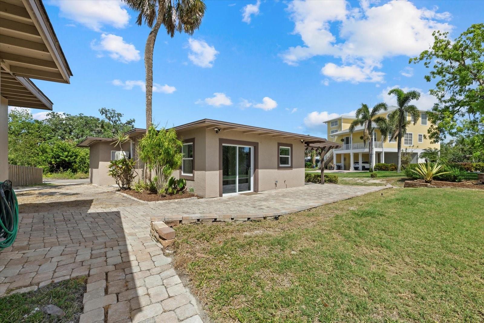 Welcome to your peaceful oasis! This beautifully remodeled 2-bedroom, 1-bath home is perfectly positioned on a scenic riverfront lot, offering breathtaking water views right from the comfort of your living room. Whether you're sipping your morning coffee or unwinding after a long day, the tranquil surroundings make every moment feel like a getaway. Inside, you’ll find a modern, thoughtfully updated interior with fresh finishes throughout. Enjoy year-round comfort with a brand-new AC unit and water heater, giving you peace of mind and efficiency. Ideal as a full-time residence, weekend escape, or investment opportunity—this home delivers both charm and convenience in a quiet, nature-rich setting. Don’t miss your chance to own riverfront property with all the upgrades already done!
