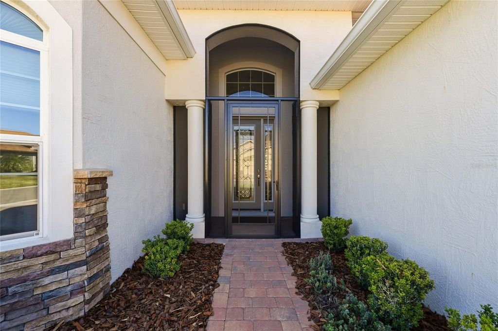 Photo of 1033 Sawgrass Drive, Winter Haven, FL 33884 (MLS # P4937685)