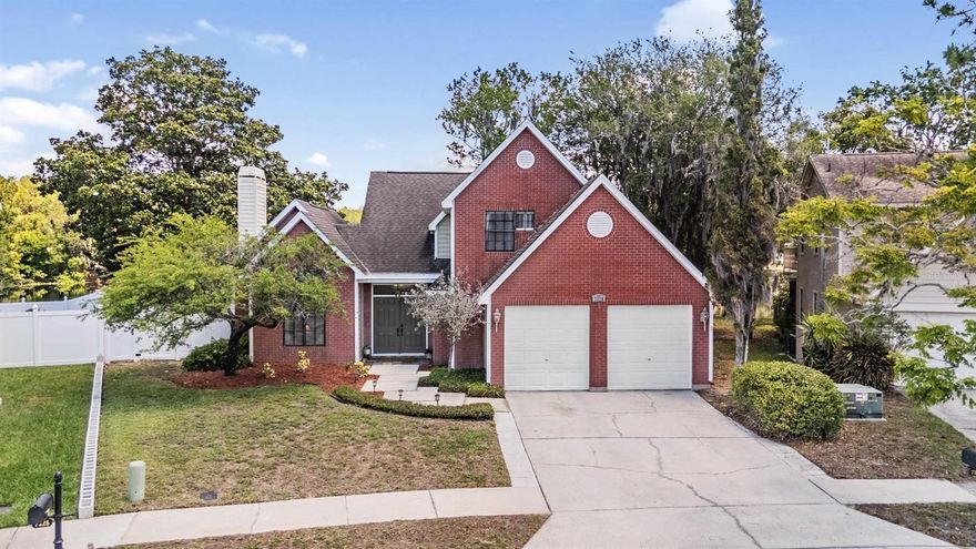 Welcome to this beautifully renovated waterfront brick home in the highly sought-after community of Nature’s Hideaway, one of the area’s best-kept secrets! From the moment you arrive, you’ll appreciate the charming and unique brick exterior, freshly painted accents, and stately curb appeal that truly set this home apart. Step through the double front doors into soaring vaulted ceilings and a light-filled, open floor plan designed for both everyday living and entertaining.

This 3 bedroom + loft, 2.5 bath home has been thoughtfully updated throughout and offers peaceful pond views from nearly every room. The spacious living room is anchored by a stunning stacked stone wood-burning fireplace, creating a warm and inviting focal point. The updated kitchen features quartz countertops, wood cabinetry, stainless steel appliances, updated sink and faucet, and a bright breakfast nook overlooking the water, perfect for starting your day.

The first-floor primary suite offers vaulted ceilings, a walk-in closet, and an updated en-suite bath with dual sinks, new faucets, updated lighting (2026), new toilet (2024), garden tub, and a spacious walk-in shower. The main level also includes indoor laundry and a refreshed half bath with updated fixtures. Upstairs, you’ll find a versatile loft space along with two generously sized bedrooms and a shared bath. One secondary bedroom has been fully renovated (2024) with custom wood paneling, wallpaper, and upgraded closet shelving, adding a designer touch.

Step outside to your private screened porch and enjoy breathtaking Florida sunsets over the pond. The large pie-shaped lot offers plenty of space with a fenced backyard and an attached workshop, perfect for storage, hobbies, or outdoor projects.

Major updates include: NEW ROOF (2019), NEW AC (2026), NEW WATER HEATER (2026), interior paint (2019), luxury vinyl plank flooring in living areas (2019), new carpet (2019), quartz countertops (2019), new 6” baseboards (2019), updated lighting throughout, new blinds, refreshed plumbing fixtures, and tile regrouted in main areas and primary shower (2026).

Conveniently located near shopping, top-rated schools, Trinity Medical Center, Fox Hollow Golf Course, YMCA, and major roadways. LOW HOA, NO CDD, and NO flood insurance required.

This home combines charm, updates, and a beautiful waterfront setting, there is truly nothing left to do but move in!