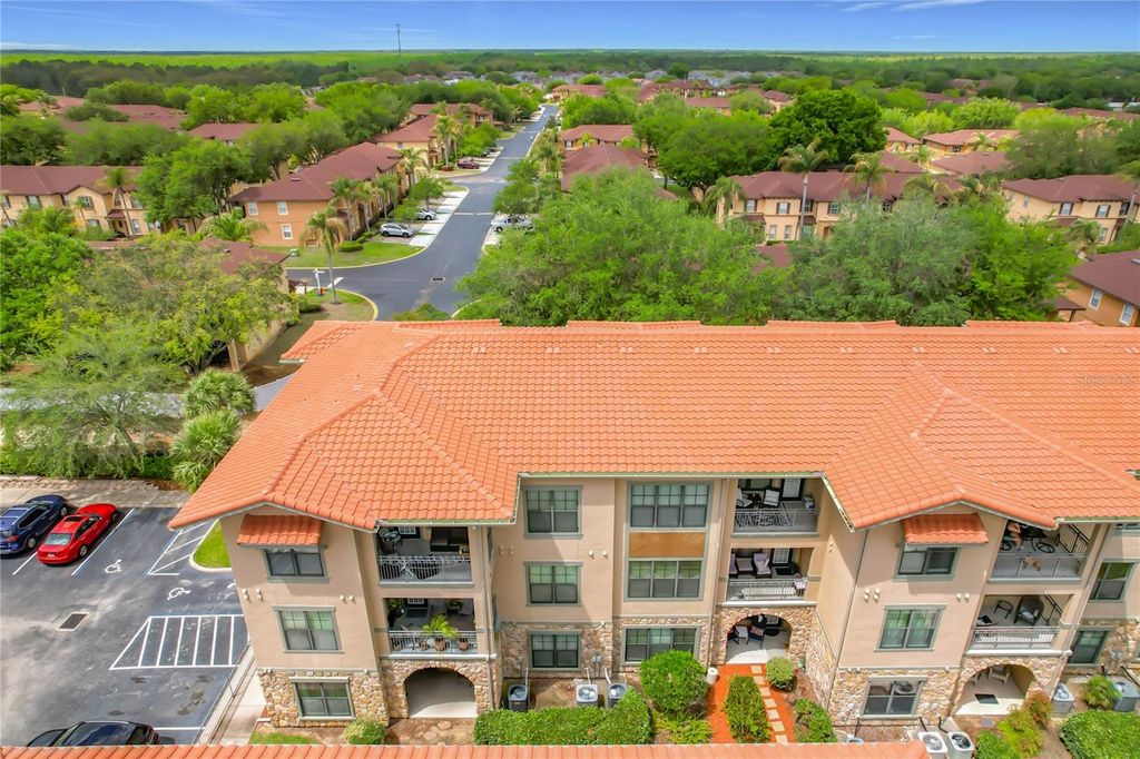 Photo of 910 Charo Parkway #311, Davenport, FL 33897 (MLS # O6394859)