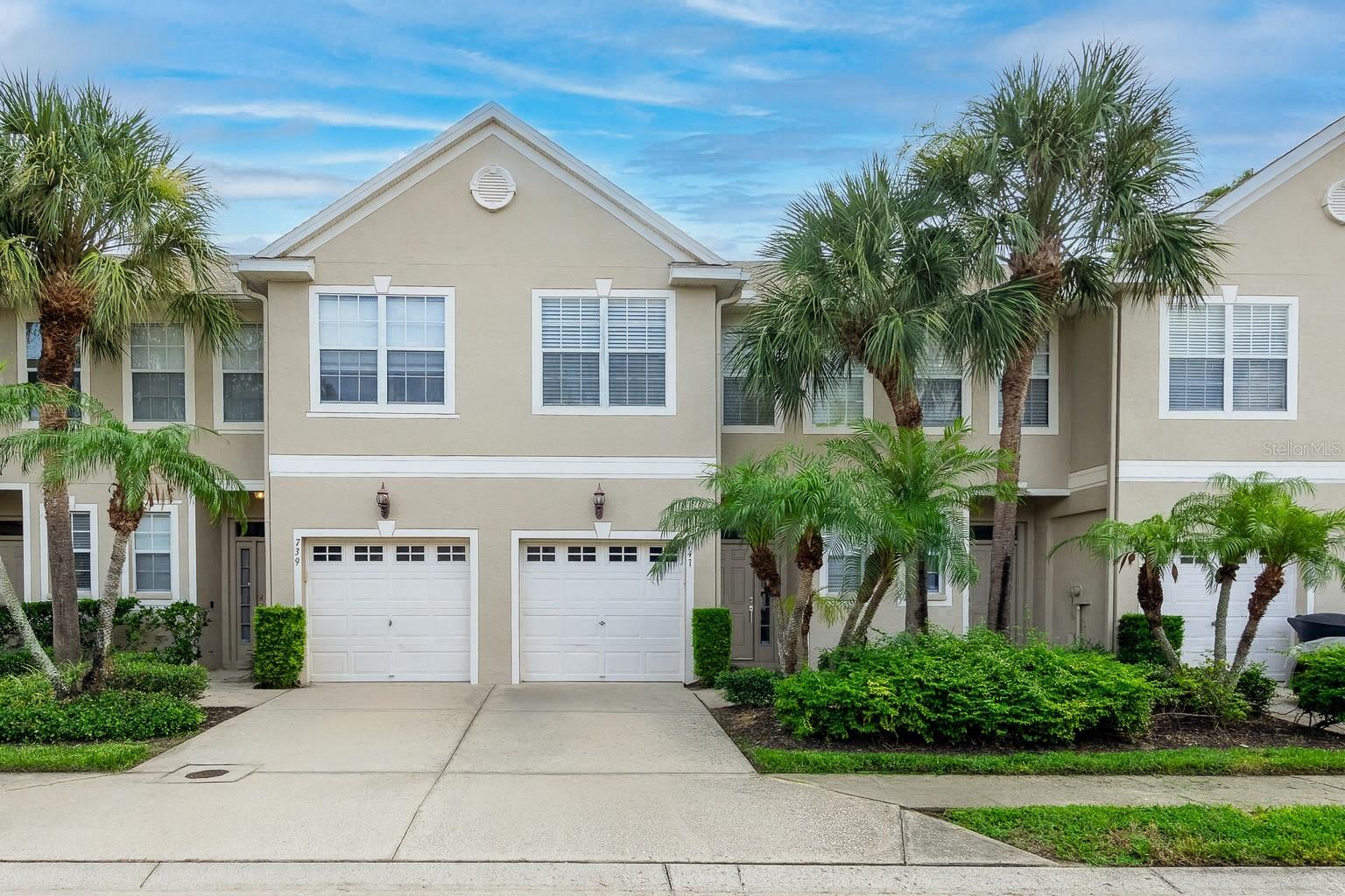 Welcome to this beautifully maintained 3 bedroom, 2.5 bathroom concrete block townhome in the sought-after Wyngate at Brighton Bay community of NE St. Pete. With 1,343 sq. ft. of living space, a 1-car garage, and located in Flood Zone X (no flood insurance required), this home has never experienced water intrusion or hurricane damage.
Perfectly positioned between the Gandy Bridge and Howard Frankland Bridge, commuting is a breeze with quick access to both Downtown St. Pete and Downtown Tampa in under 15 minutes. Tampa International Airport and St. Pete/Clearwater Airport are also just minutes away.
The neighborhood offers resort-style amenities including a heated pool, hot tub, tennis courts, pickleball, basketball, sand volleyball, playground, and scenic walking paths with pet relief stations. You can even fish in the community lake or enjoy bird watching by the mailbox pavilion.
Inside, the main floor features tall ceilings, a welcoming foyer with coat closet, a convenient powder bath, and an open-concept kitchen, living, and dining area—ideal for entertaining. Step out to the large paved patio with a generous storage closet, perfect for beach gear, garden tools, or seasonal décor.
Upstairs, you’ll find a split bedroom layout with a spacious primary suite offering vaulted ceilings, an updated bath with granite countertops, open shelving, and a walk-in tile shower, plus a large walk-in closet. The two guest bedrooms feature custom closets with additional luggage storage. A full guest bath, laundry closet with shelving, and linen closet complete the second floor. All 3 bedrooms have custom built out closets for maximum storage convenience.
The attached garage includes storage cabinets and shelving, keeping everything organized. With its unbeatable location, extensive amenities, and solid construction, this home offers the ultimate low-maintenance Florida lifestyle.