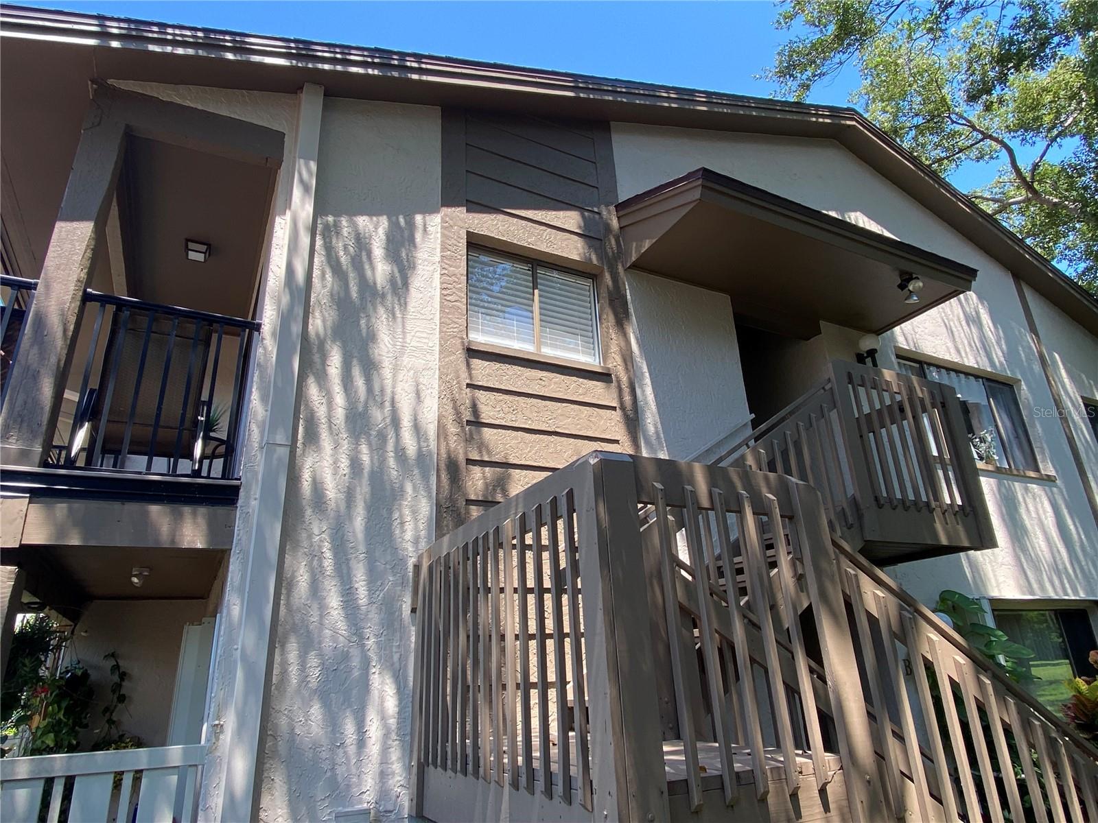 55+ Second Floor Condo with Peaceful Golf Course Views
Enjoy the relaxed Florida lifestyle in this inviting 55+ second floor condo overlooking the serene and picturesque golf course. The thoughtfully designed floor plan offers a bright and efficient kitchen, complete with space for a small breakfast table. Just off the kitchen, a charming open porch is the perfect spot to enjoy your morning coffee or unwind at the end of the day.
For added convenience, the laundry closet is located in the kitchen—making it easy to prepare meals while finishing a load of wash. The kitchen flows seamlessly into the dining area and spacious living room, creating an open and airy feel throughout the main living space.
An additional flex room, originally designed as the dining area, provides cozy extra space perfect for reading, crafts, hobbies, or a home office. The split bedroom layout ensures privacy, with the guest bedroom and full bath on one side, and the primary suite—featuring an ensuite bath—on the other.
The living room opens to a screened porch, where tranquil golf course views set the stage for peaceful afternoons. A dedicated carport provides shade and protection for your vehicle. Best of all, all appliances and furniture are included in the sale, making this an easy, turn-key transition into your new home.
The condo complex offers its own pool, hot tub, shuffleboard, and community center, and as part of the larger Beacon Woods community, residents enjoy access to even more: a heated pool, lighted tennis and pickleball courts, basketball, bocce ball, playground, exercise room, and clubhouse activities ranging from dances and yoga to seasonal gatherings.
The monthly fee of just $410 covers exterior maintenance, water, sewer, garbage, cable TV with internet, access to amenities, and dues for the Beacon Woods community—leaving only your electric bill. With a well-run association, strong reserves, and recent upgrades already completed, residents benefit from worry-free living with no surprise assessments.
This move-in ready condo—complete with furnishings and appliances—combines comfort, community, and convenience in a beautifully maintained setting - start living the lifestyle you’ve been waiting for.