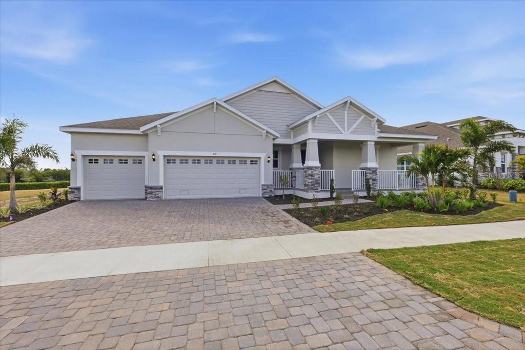 Photo of 910 Signet Dr, Apollo Beach, FL 33572 (MLS # O6327602)