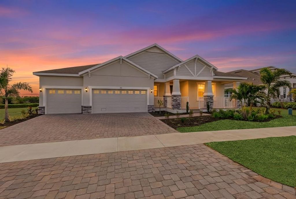 Photo of 910 Signet Dr, Apollo Beach, FL 33572 (MLS # O6327602)