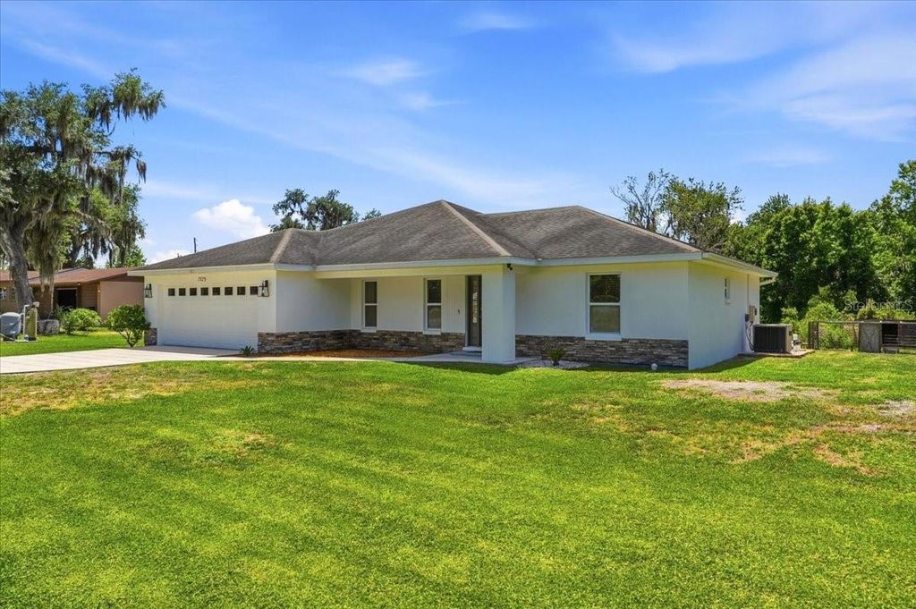 Photo of 7125 Honeysuckle Drive, Lakeland, FL 33813 (MLS # P4938792)
