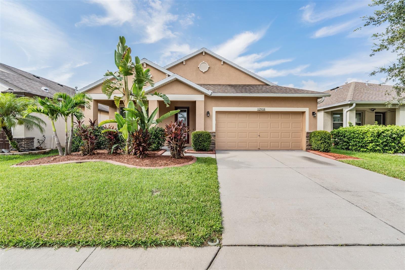 Discover a private oasis in the heart of Trinity! Tucked away on a quiet cul-de-sac within a gated community, this well-maintained 4-bedroom, 2-bath home offers the perfect blend of elegance, privacy, and convenience. Backing onto a peaceful nature reserve, the home’s serene setting is ideal for those who crave both beauty and seclusion.
Located just minutes from shopping, dining, and top-rated medical facilities—and with Odessa Elementary close by—this property is designed for both everyday ease and family-friendly living. Enjoy the financial perks of a low HOA, NO CDD fees, and NO flood insurance required, while benefiting from seamless access to the Suncoast Parkway for an effortless commute to Tampa, the airport, and beyond.
Step inside to find a spacious kitchen featuring granite countertops, a gas range, ample cabinet space, and a built-in desk—perfect for meal preparation or planning. The separate dining room is made for memorable gatherings, while the inviting outdoor space is a true showstopper: a paver patio with a cozy fire pit, a soothing waterfall feature, and lush landscaping, all framed by uninterrupted views of the nature preserve.
With no rear neighbors, this backyard retreat with custom waterfall offers unmatched privacy—ideal for relaxing evenings or weekend entertaining. Don’t miss your chance to own this exceptional home where comfort, convenience, and natural beauty meet!