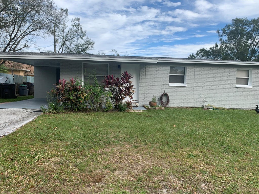 Photo of 3801 Argon Drive, Tampa, FL 33619 (MLS # TB8550477)