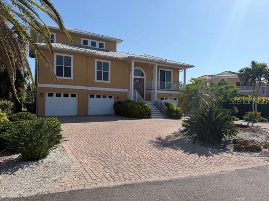 Experience waterfront living in this elevated 3-bedroom-3-bath with additional nonconforming bedroom, bathroom and recreation room off of the pool.  This versatile area adds functionality to the living space. Screened porches provide a tranquil view of Little Sarasota Bay. Highlights include a circular driveway and 3+ car garage. Boating enthusiasts will enjoy the private dock complete with an 18,000-pound boat lift, electricity and water, offering direct access to the Intracoastal Waterway. A rare opportunity to live the ultimate coastal lifestyle. This home has had no hurricane damage or flooding. A Key West style home with massive bedrooms, en-suite bathrooms and an elevator to take you to every level.

Professional photography is scheduled.