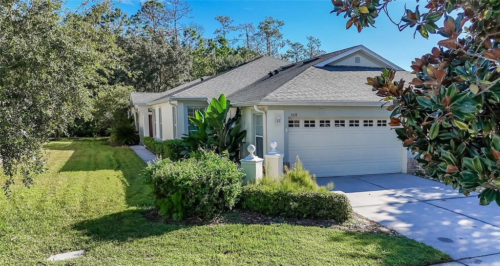 Photo of 3428 Chapel Creek Circle, Wesley Chapel, FL 33544 (MLS # TB8553793)