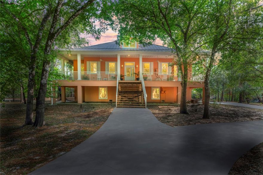 Tucked away at the end of a quiet cul-de-sac on the eastern edge of Hernando County, this extraordinary waterfront retreat offers rare peace, privacy, and direct access to nature. Now offered at a new price, the seller is highly motivated. So don’t miss this opportunity! Set on 1.5 acres with an incredible 780 feet of frontage along the Withlacoochee River, the property blends luxury, sustainability, and function in one impressive package. This custom-built home was constructed using Insulated Concrete Forms (ICF) and is LEED Certified, ensuring exceptional energy efficiency and long-term durability. Designed for both comfort and eco-conscious living, the interior features high ceilings, expansive living spaces, and serene river views from multiple rooms. Car enthusiasts will appreciate the oversized garage with space for up to eight vehicles! Outdoors, enjoy morning coffee on the screened wraparound porch, or launch a kayak right from your backyard. Located in the Riverdale community with no HOA fees or deed restrictions, this secluded haven is positioned conveniently between Dade City and Ridge Manor, with easy access to I-75 for a smooth commute. Whether you're seeking a primary residence or a weekend escape, this riverside home is a unique opportunity to embrace Florida living in its most tranquil form.