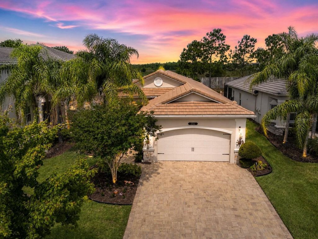 Photo of 2761 Tarragona Way, Wesley Chapel, FL 33543 (MLS # TB8501988)