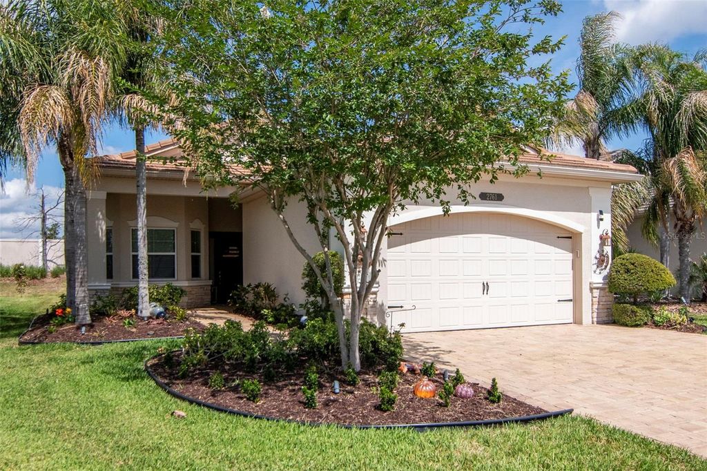 Photo of 2761 Tarragona Way, Wesley Chapel, FL 33543 (MLS # TB8501988)